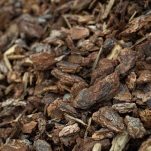 Close-up of brown wood chips used as mulch.