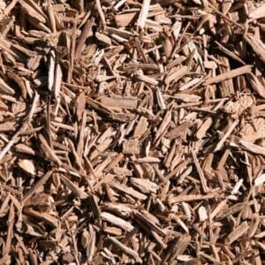 Close-up of brown wood chips scattered densely.